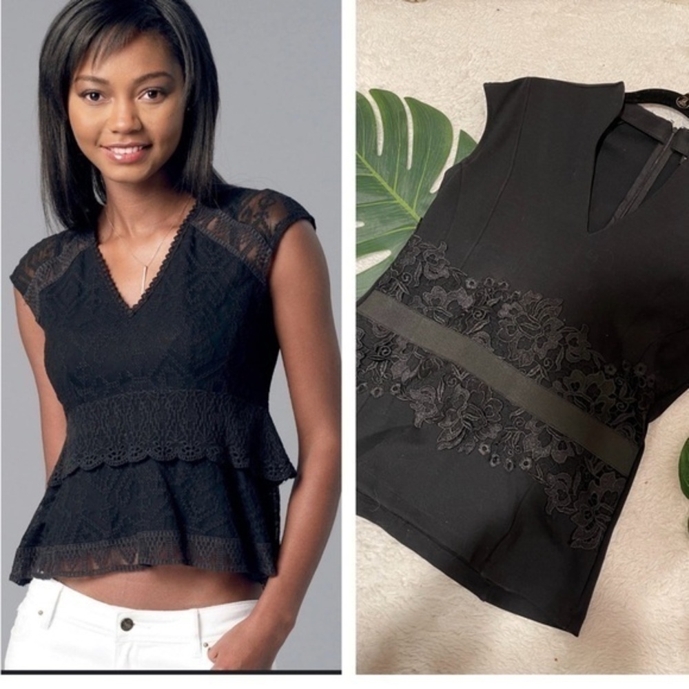 Black peplum, lace, cap sleeve top with elastic at the waist! Back zip! stunning
